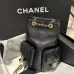 Chanel Mochila, Piel de cordero efecto brillo y metal dorado #A49155