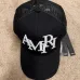 Amiri Staggered Logo Trucker Hat Black #A37246