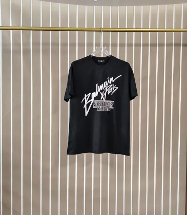 Balmain Paris Black/White T Shirt Featuring Stranger Things Logo and Bold Collaborative Graphic Design for Streetwear Fans #A54259