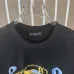 Balmain Paris White/Black T Shirt with Gold Chain and Blue Ribbon Circular Graphic Design for Men #A54257