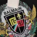 Balmain Paris White/Black T Shirt with Gold Chain and Blue Ribbon Circular Graphic Design for Men #A54258